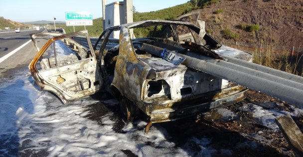 Bariyerin İçinden Geçen Otomobil Alev Aldı: Ölümden Döndüler