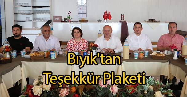 Bıyık'tan Teşekkür Plaketi