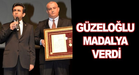 Güzeloğlu madalya verdi