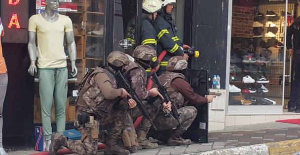 Kocaeli'de iş yerini basan silahlı şüpheliyi polis ikna etti