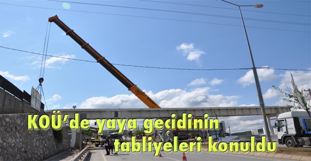 KOÜ'de yaya geçidinin tabliyeleri konuldu