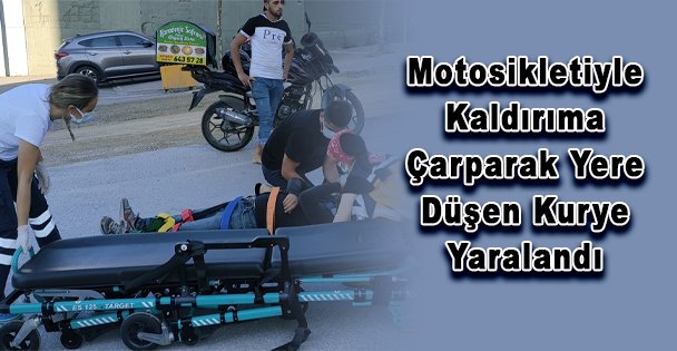 Motosikletiyle Kaldırıma Çarparak Yere Düşen Kurye Yaralandı