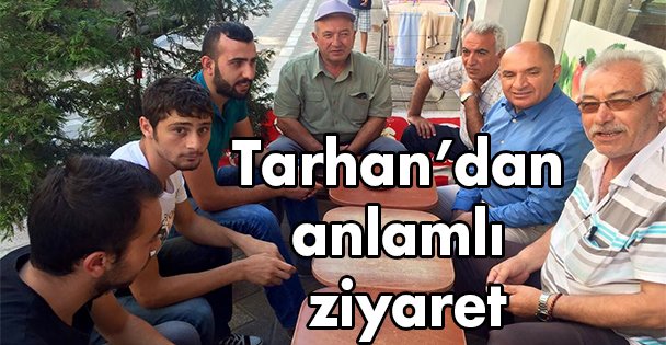 Tarhan'dan anlamlı ziyaret