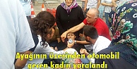 Ayağının üzerinden otomobil geçen kadın yaralandı