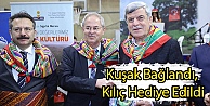 Kuşak Bağlandı, Kılıç Hediye Edildi