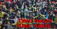 Omuz omuza yürek yüreğe