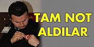 Tam not aldılar