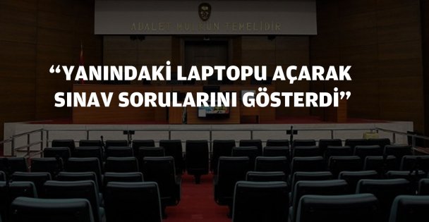 'Yanındaki laptopu açarak sınav sorularını gösterdi'